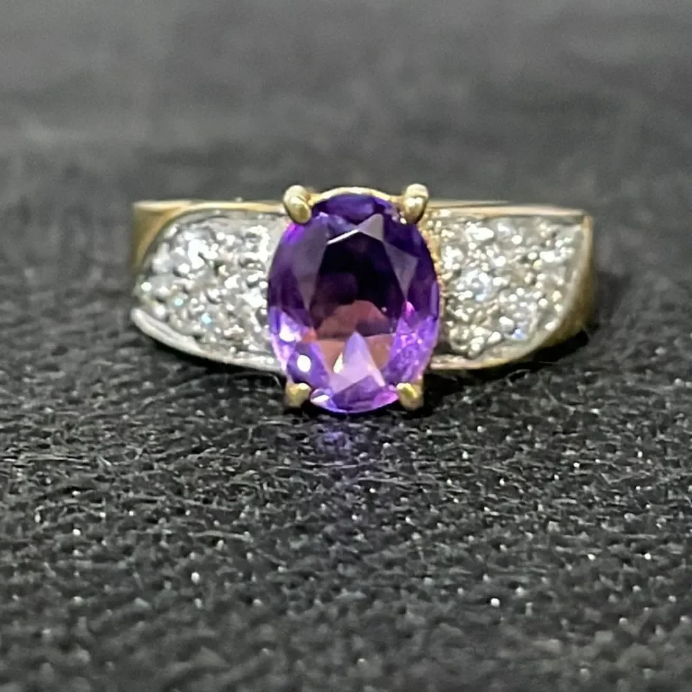 Large ring with a large purple gem